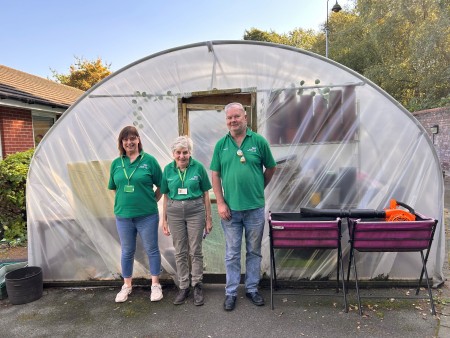P Cross Volunteers outside Polytunnel.jpg